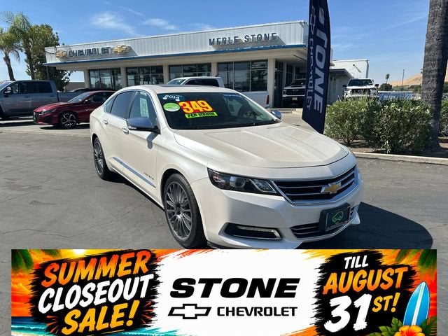 2014 Chevrolet Impala LTZ in White Diamond Tricoat — front three-quarter view