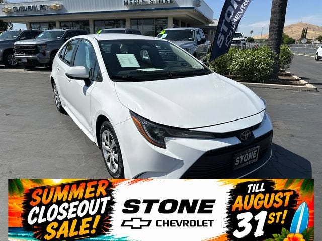 2024 Toyota Corolla LE in White — front three-quarter view